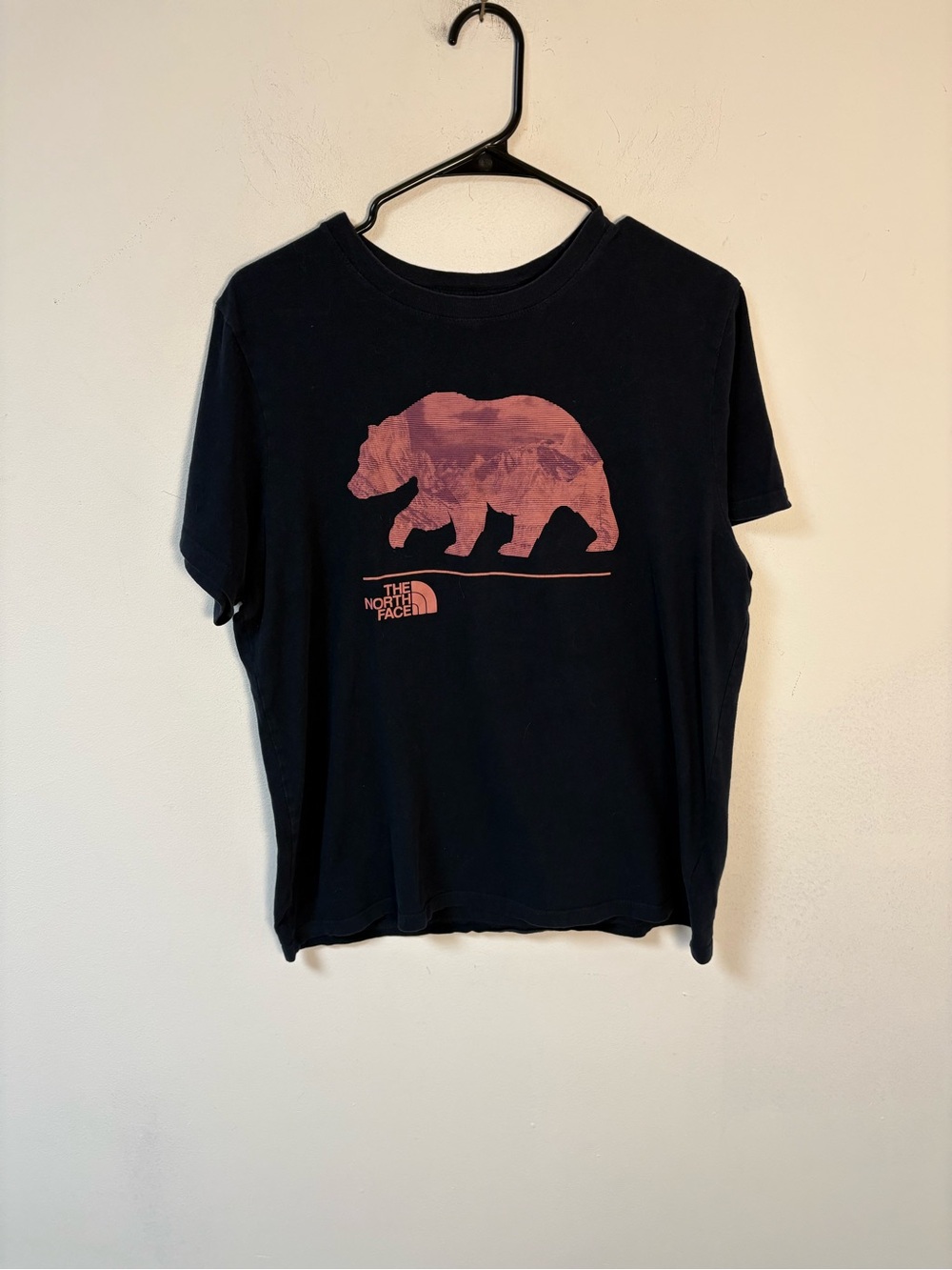The North Face Womens Black Tee with Pink Bear Graphic and Mountain Motif Large
